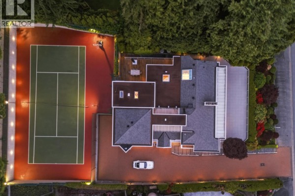 Panoramic view of the water with ships, from a property with a tiled roof. - 1574 Chartwell Drive, West Vancouver