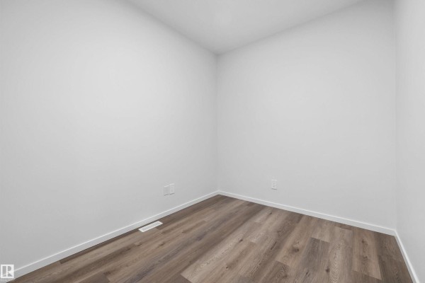 Primary Bedroom - 15744 7 St Ne, Edmonton, AB T5Y4M6 Photo 5