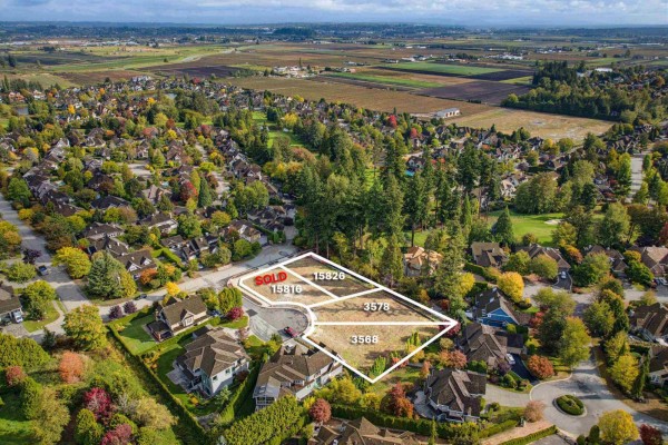 Aerial view of four marked residential lots, one labeled SOLD, in a suburban neighborhood. - 15826 36 Avenue, Surrey