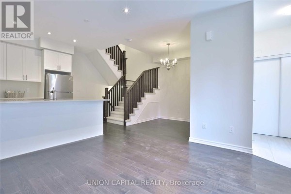 Bedroom 2 - 16 - 18 Applewood Lane, Toronto, ON M9C0C1 Photo 5