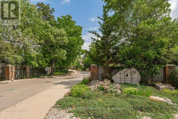 Street sign and landscaping at the entrance to the complex. - 16 - 784 Gordon Street, Guelph