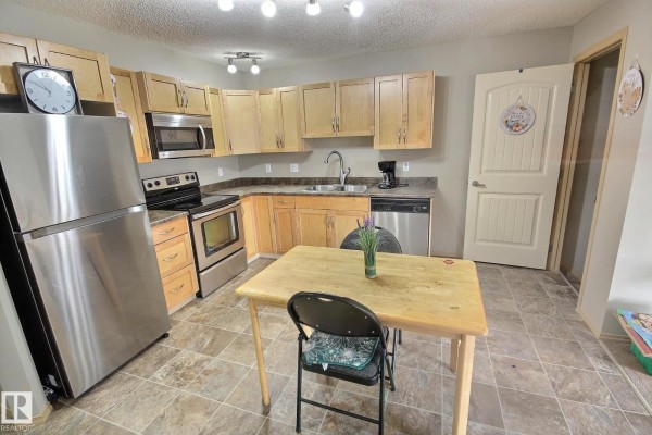 Family room - #16 604 62 St Sw, Edmonton, AB T6X0K4 Photo 4