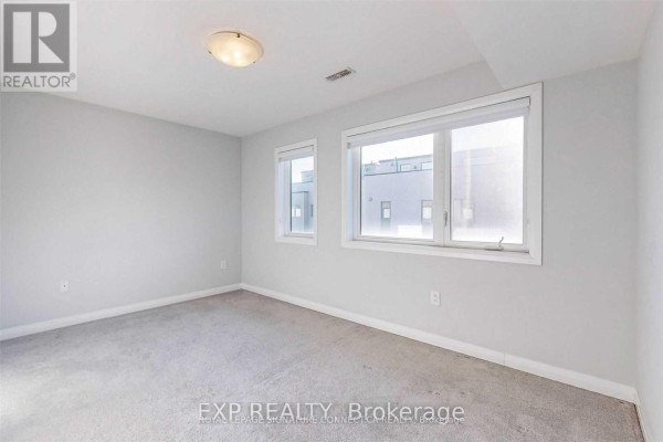 16 Caroline Carpenter Grove, Toronto, ON M3K0B1 Photo 2