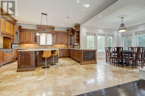 Kitchen with island and dining area - 16 Fairview Avenue Richmond Hill