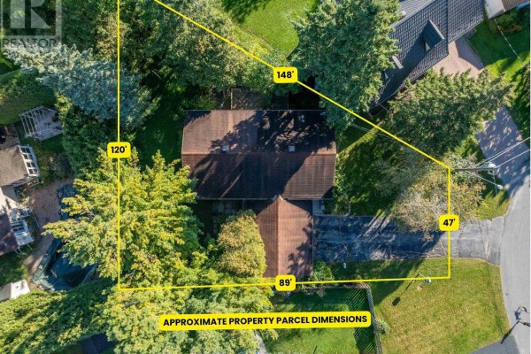 Aerial view showing property parcel dimensions and surrounding trees. - 16 Gold Crescent, Russell