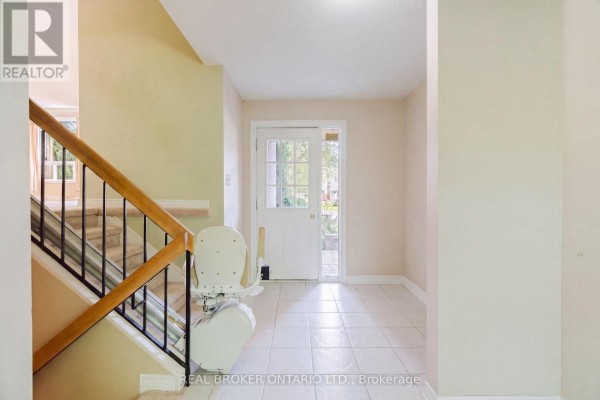 Interior foyer with beige walls, tile floor, and a white front door. - 16 Gold Crescent, Russell