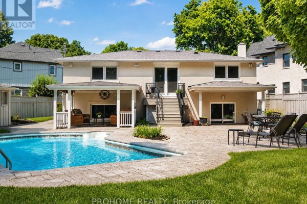 Backyard with swimming pool and patio - 16 Tuscay Court Markham