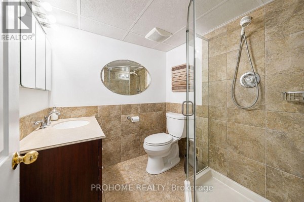 Bathroom with vanity, toilet, and glass shower - 16 Tuscay Court Markham