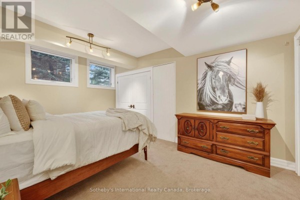 Bedroom with horse artwork and wooden dresser - 160 Sunset Boulevard Blue Mountains