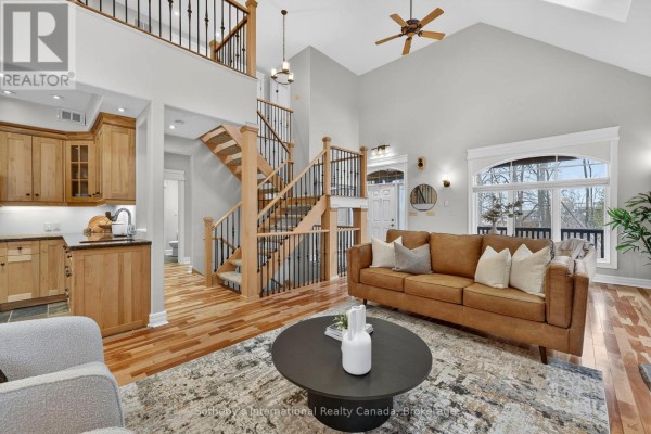 Leather sofa, vaulted ceiling & wood staircase - 160 Sunset Boulevard Blue Mountains