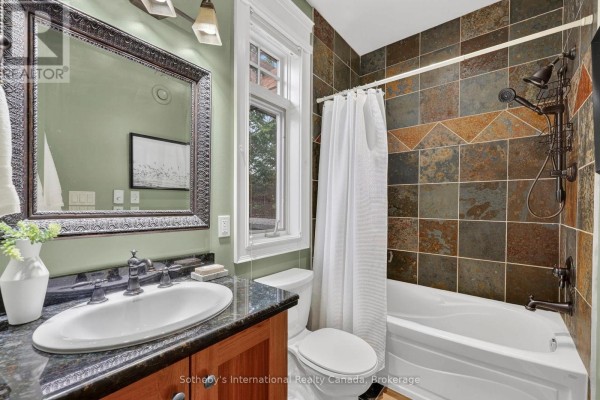 Bathroom with vanity, tub, and tiled shower walls - 160 Sunset Boulevard Blue Mountains