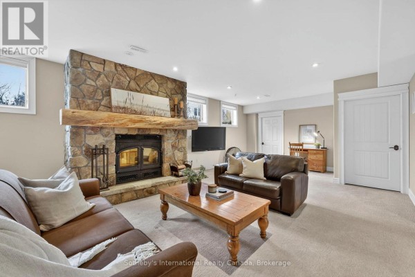 Stone fireplace, sectional sofa, leather sofa, coffee table - 160 Sunset Boulevard Blue Mountains