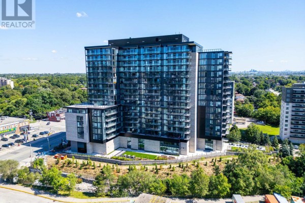 Aerial view of the glass apartment building with surrounding urban landscape and trees. - 1602 - 86 Dundas Street E, Mississauga