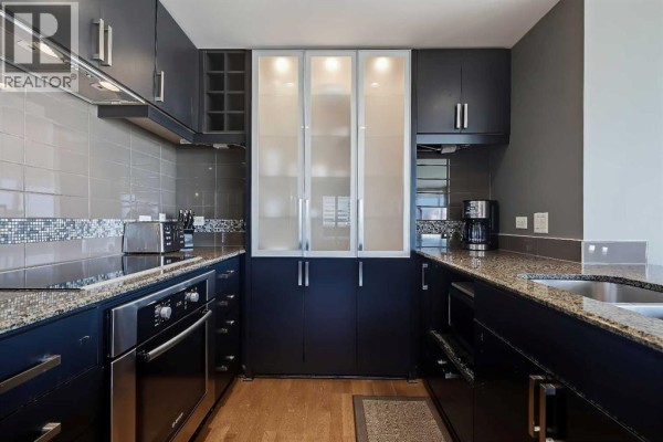 Primary Bedroom - 1604, 888 4 Avenue Sw, Calgary, AB T2P0V2 Photo 5