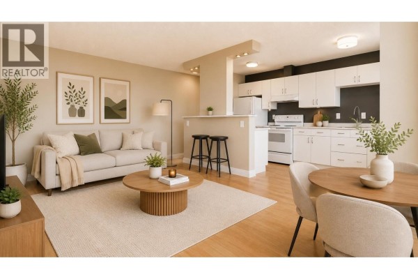 Apartment living room and kitchen with light wood floors, neutral walls, and white cabinetry. - 1607 145 St. Georges Avenue, North Vancouver
