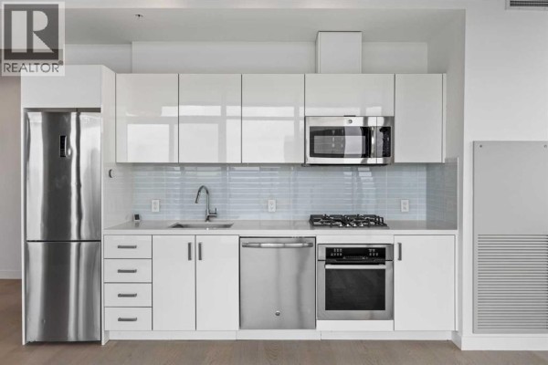 Living room - 1608, 1010 6 Street Sw, Calgary, AB T2R1B4 Photo 3