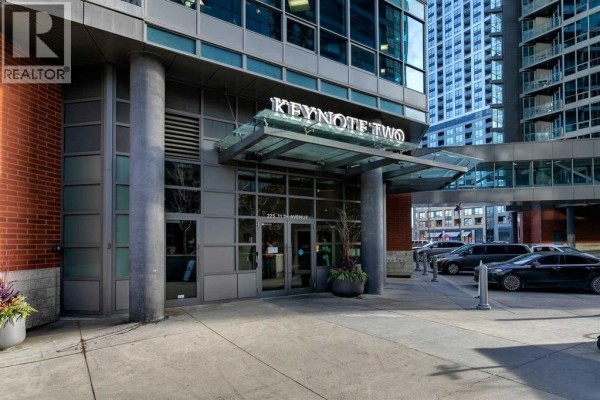 Building entrance for Keynote Two at 225 11 Avenue SE with glass doors and canopy. - 1610, 225 11 Avenue Se, Calgary