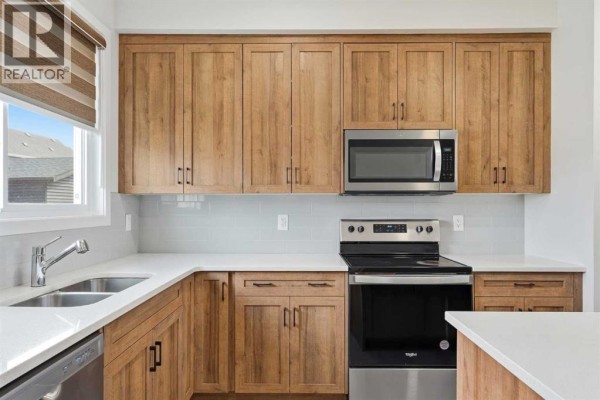Family room - 1612 Rangeview Drive Se, Calgary, AB T3S0K1 Photo 5