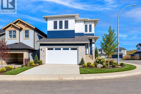 Floor plan for a two-story house with kitchen, family room, bedrooms, bathrooms, and bonus room. - 162 Heritage Court, Cochrane