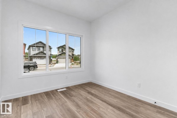 Kitchen - 1621 210a St Nw, Edmonton, AB T6M3N9 Photo 3