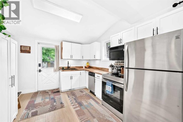Laundry room - 1628 15 Street Se, Calgary, AB T3G3L9 Photo 5