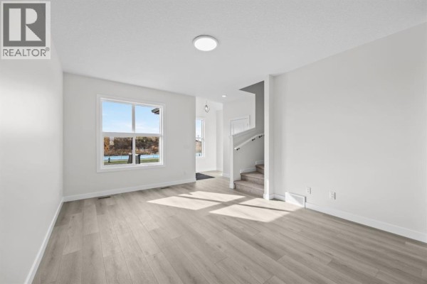 Living room - 1628 Keystone Creek Avenue Ne, Calgary, AB T3P2V3 Photo 4