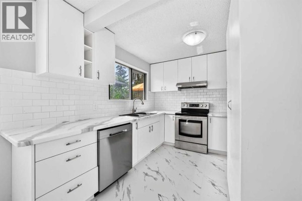 Living room - 163, 6915 Ranchview Drive Nw, Calgary, AB T3G1R8 Photo 5