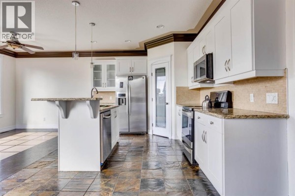 Kitchen - 165 Lynx Crescent, Fort Mcmurray, AB T9K0C5 Photo 3