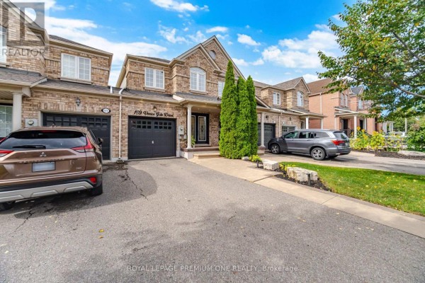 Exterior view of a townhouse at 169 Venice Gate Drive, Vaughan. - 169 Venice Gate Drive, Vaughan