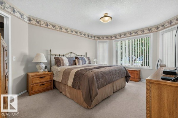 Family room - #17 9 Dechene Rd Nw, Edmonton, AB T6M2V1 Photo 4