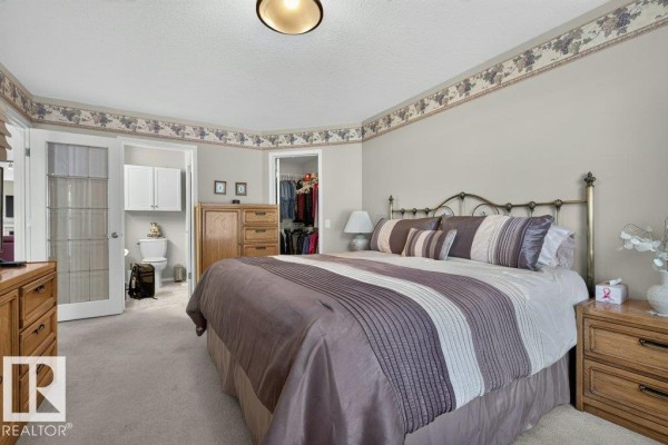 Primary Bedroom - #17 9 Dechene Rd Nw, Edmonton, AB T6M2V1 Photo 5