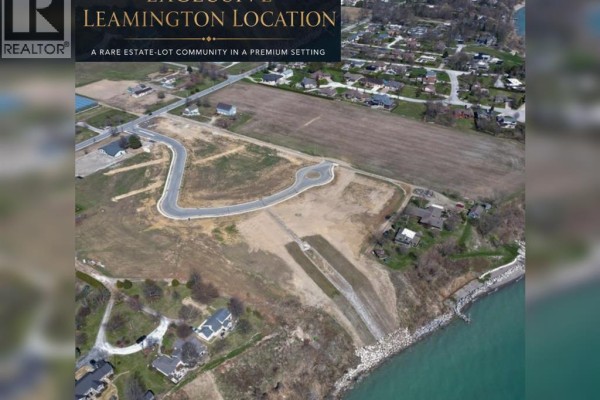 Expansive aerial view of waterfront development land with surrounding homes and water. - 17 Vista Isle Avenue, Leamington