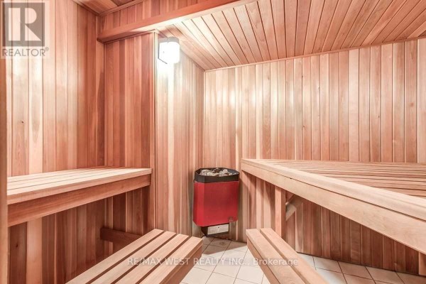 Modern wood sauna with benches and heater - 170 Newton Drive Toronto