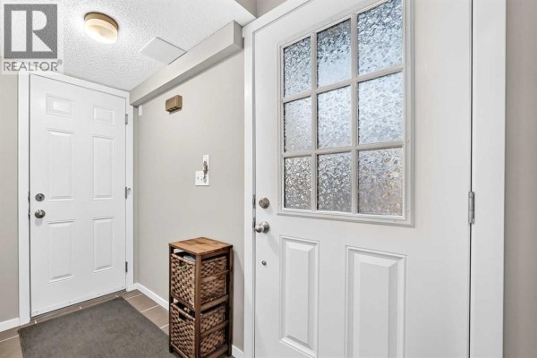 Bedroom - 1701, 125 Panatella Way Nw, Calgary, AB T3K0R9 Photo 5