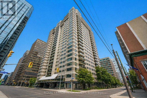 Street view of the apartment building with glass and stone facade. - 1705 - 199 Kent Street, Ottawa