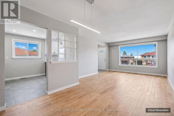 Kitchen with white appliances, wooden cabinetry, and tiled flooring, open to a dining area. - 171 Petworth Crescent, Toronto