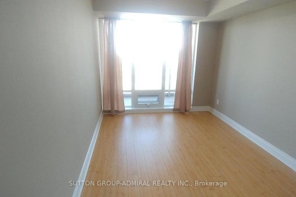 Kitchen with light wood cabinets, granite countertops, white appliances, and tile flooring. - #1712 - 7 North Park Road, Vaughan