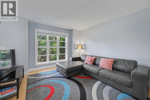 Living room - 172 Coverton Circle Ne, Calgary, AB T3K4R6 Photo 4