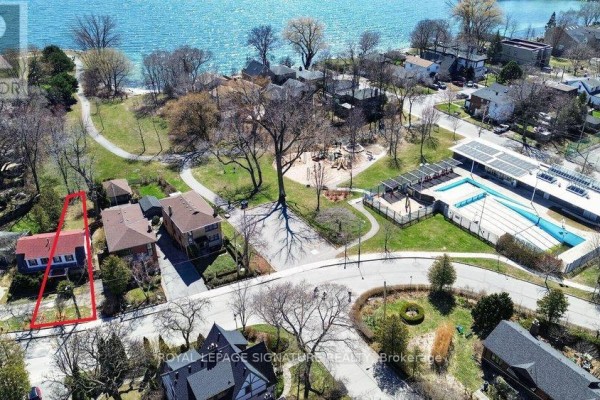 Aerial view of residential area with lake, park, and outdoor swimming pool. - 175b Lake Shore Drive, Toronto