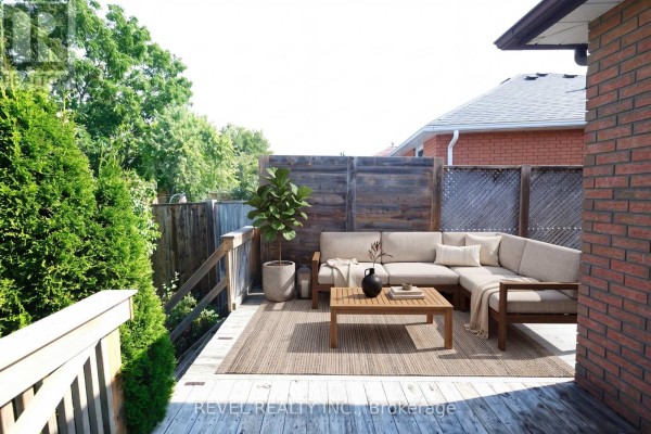 Modern deck patio with sectional sofa and coffee table - 176 Towerhill Road Peterborough