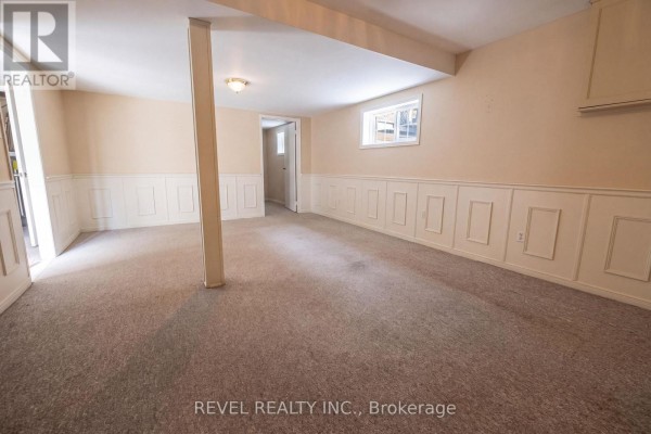 Finished basement with wainscoting and carpet - 176 Towerhill Road Peterborough