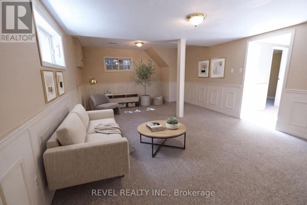 Living area with sofa and coffee table - 176 Towerhill Road Peterborough