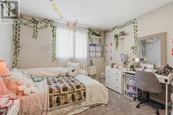 Bedroom with bed, desk, mirror, ivy decor, and birthday banner - 18 Chapman Court London North