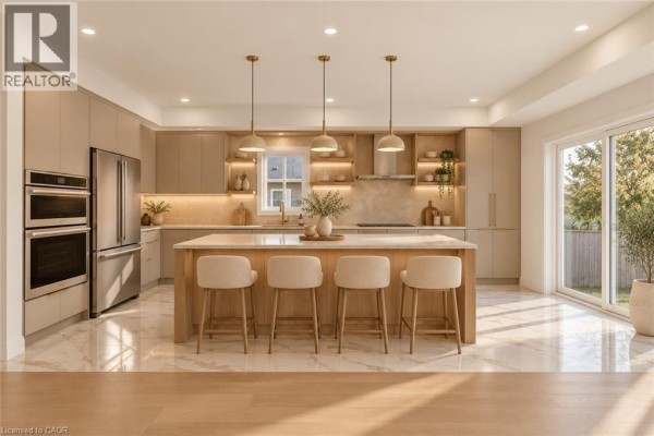 Contemporary kitchen with beige cabinetry, stainless steel appliances, large island with four bar stools. - 18 Miles Road, Hamilton