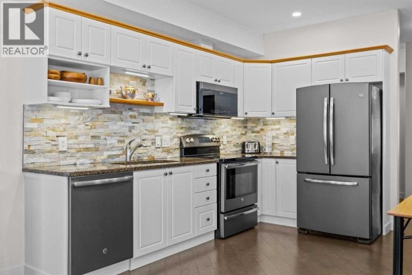 Kitchen - 180, 223 Tuscany Springs Boulevard Nw, Calgary, AB T3L2M2 Photo 4