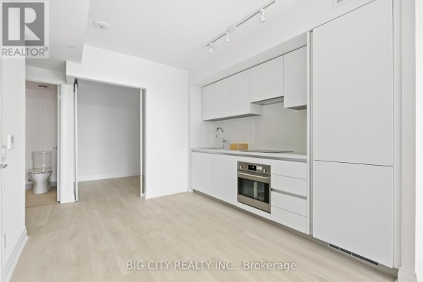 Living room - 1801 - 25 Frederick Todd Way, Toronto, ON M4G4E8 Photo 3