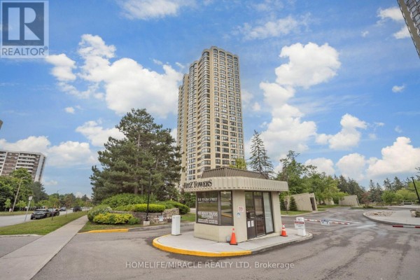 Ritz Towers apartment building with gatehouse and security gate - 8 & 10 Lisa Street Brampton