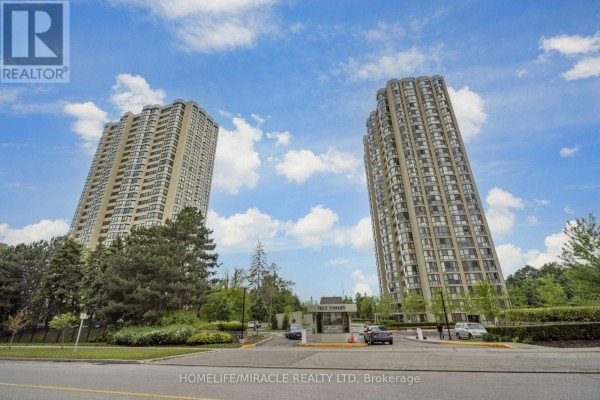 Exterior of Ritz Towers buildings with entrance gate and security booth - 1802 - 8 Lisa Street Brampton