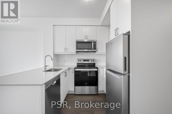 Kitchen - 1803 - 3220 William Coltson Avenue, Oakville, ON L6H7X9 Photo 3