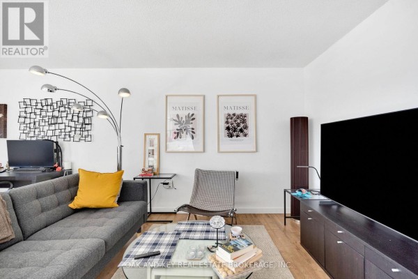 An indoor jacuzzi with tiled flooring and built-in steps with metal railings. - 1805 - 323 Colborne Street, London East